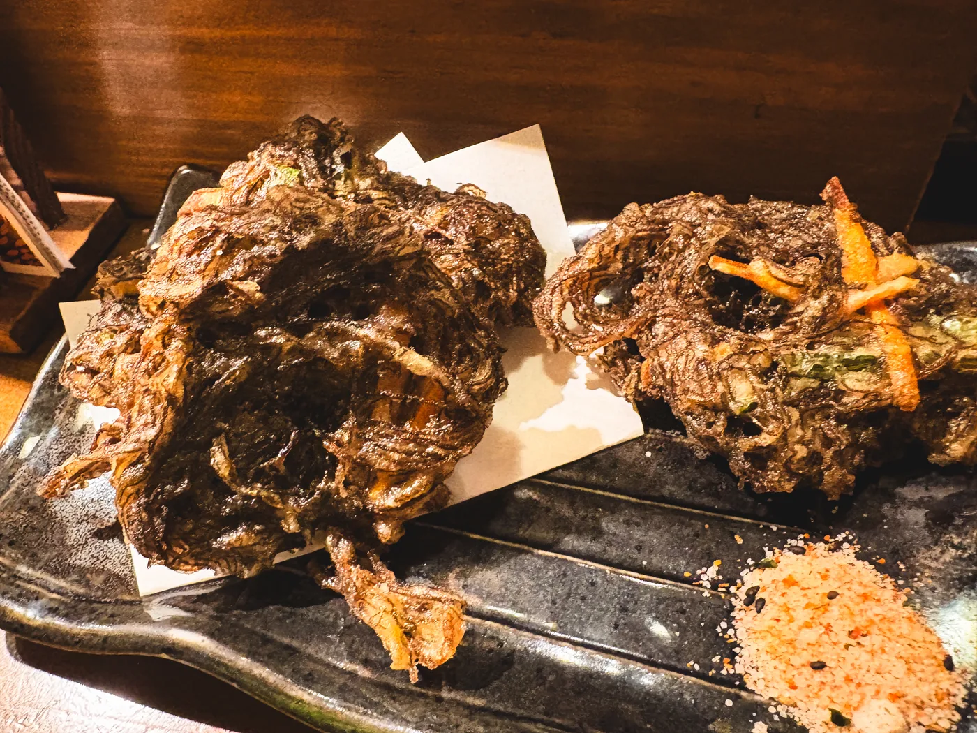 Mozuku tempura arranged on a plate