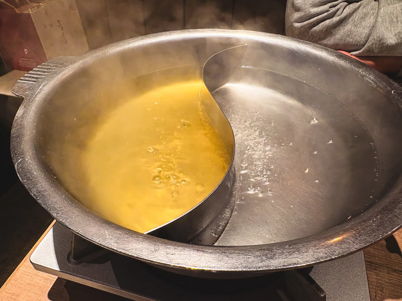 Broth in a divided shabu-shabu pot