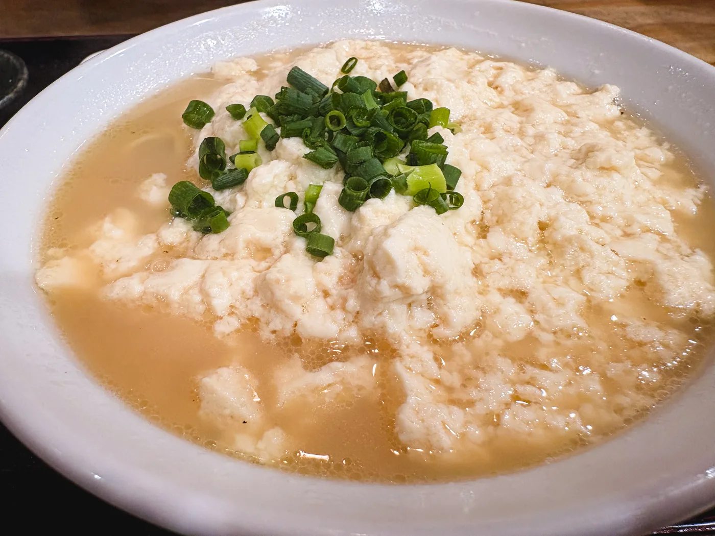 Yushi tofu soba at Tenryu topped with tofu and chopped green onions