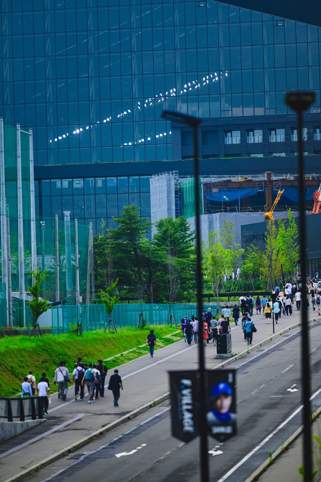 The exterior of ES CON FIELD HOKKAIDO coming into view on the walk from Kita-Hiroshima Station