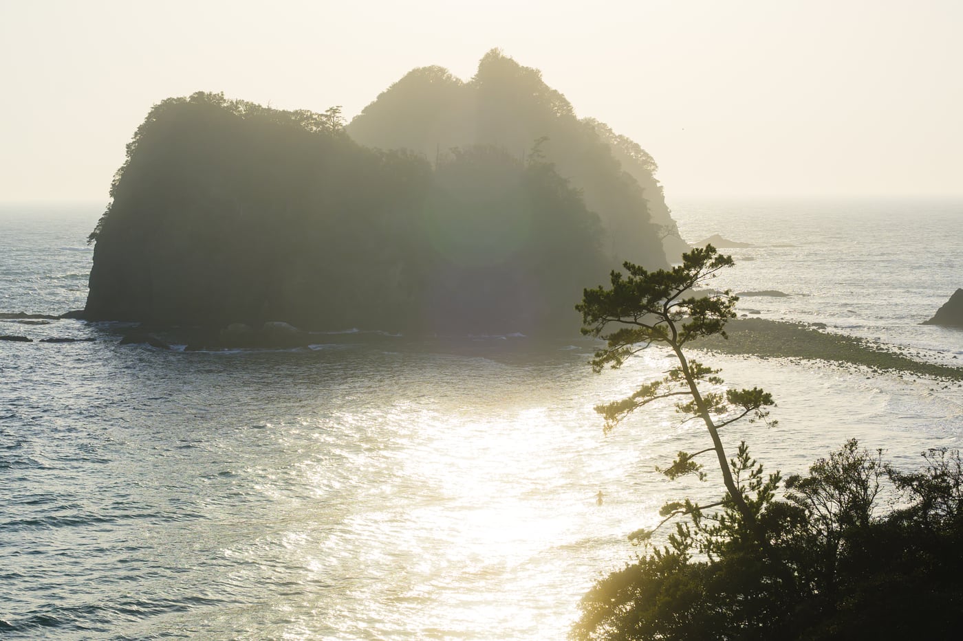 Rocks and sea at Dogashima in hazy evening light