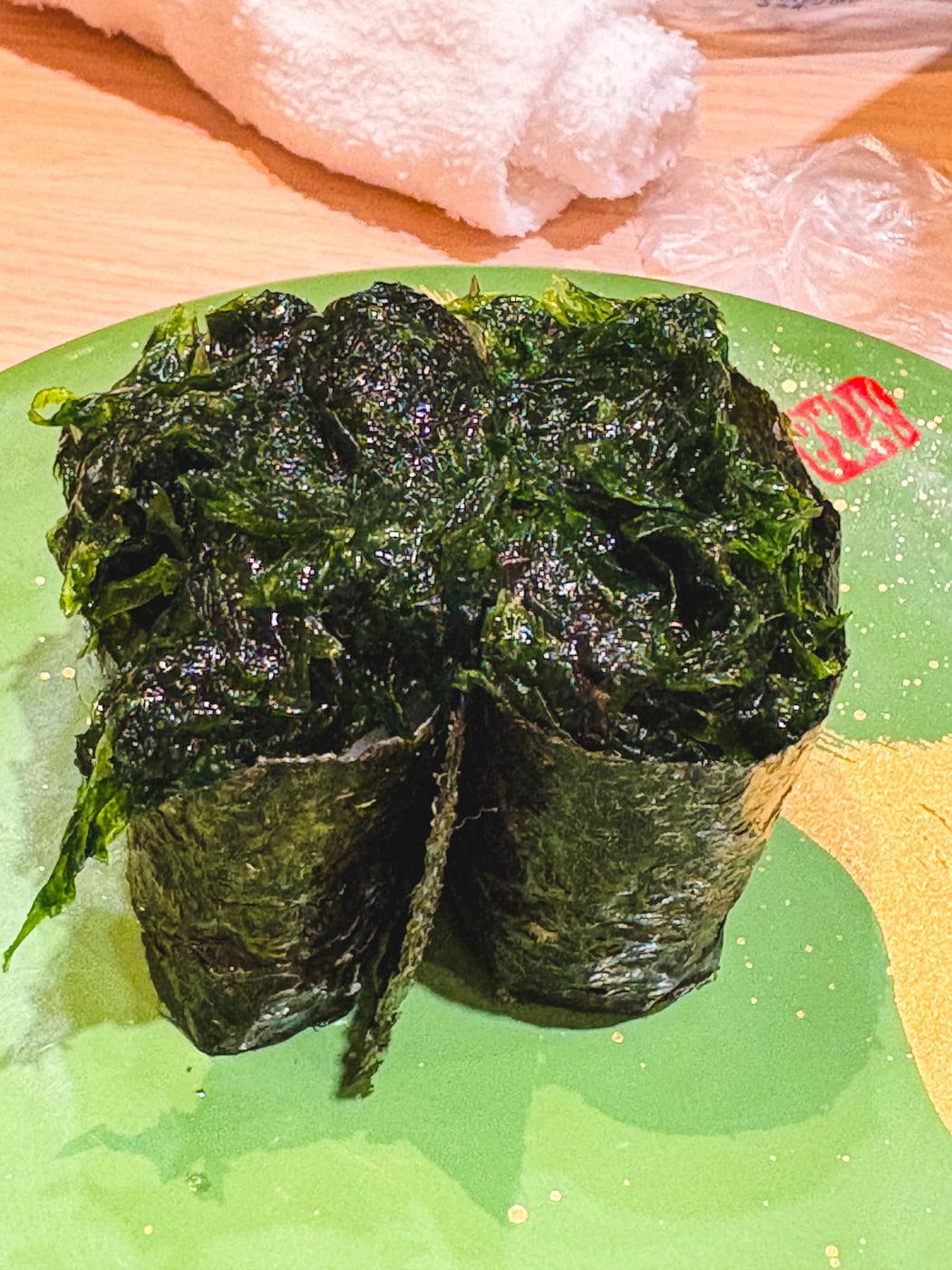 Two pieces of nori gunkan with plenty of nori piled on top