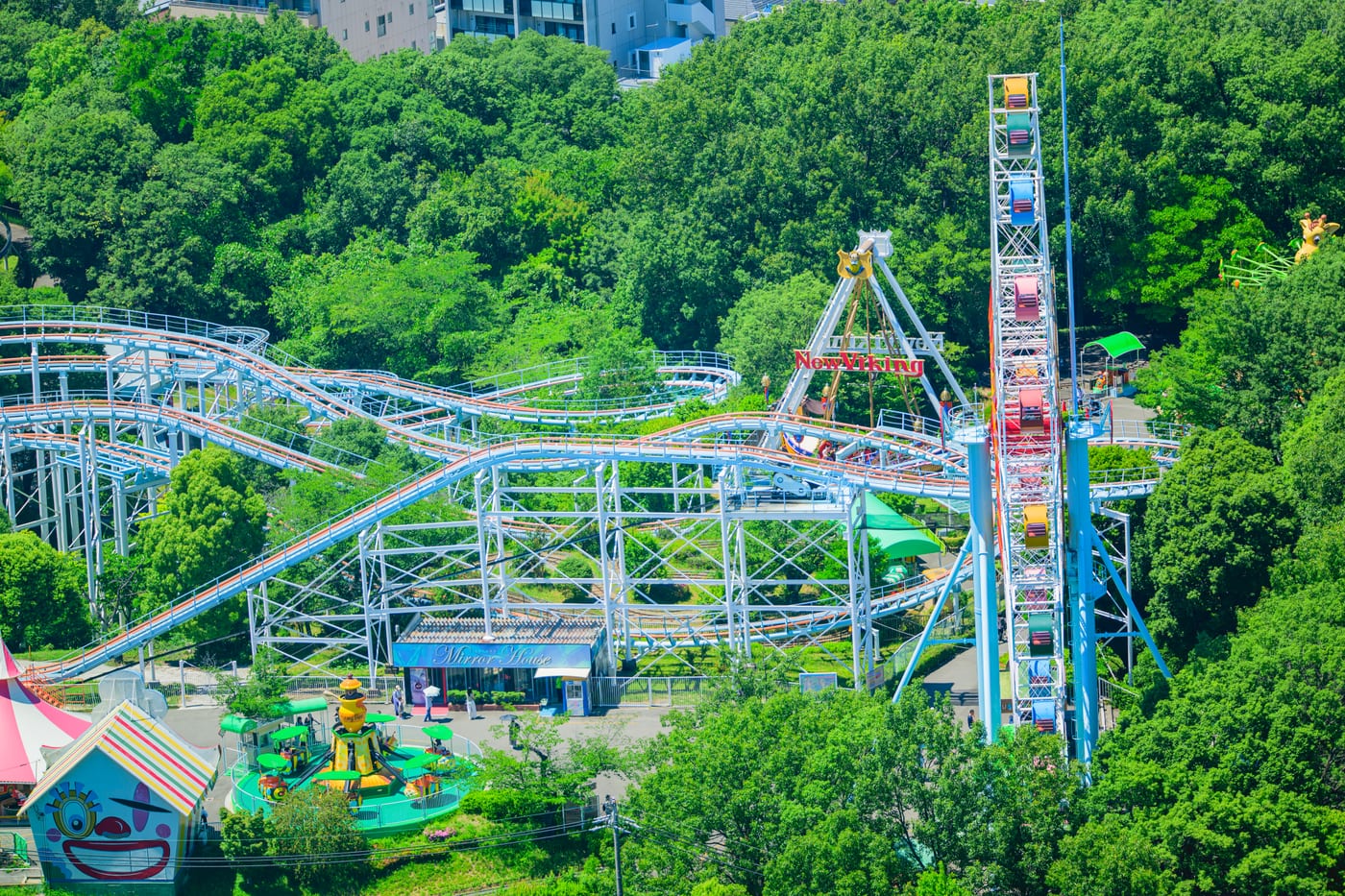 A ferris wheel and roller coaster viewed from Higashiyama Sky Tower