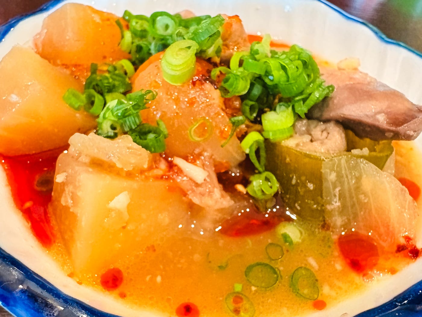 A hearty miso stew topped with sliced green onions